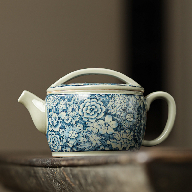 Câu chuyện đất sét Ấm trà Hanwa màu xanh và trắng gốm sứ gia dụng dụng phụ kiện ấm trà có thể nâng ấm trà