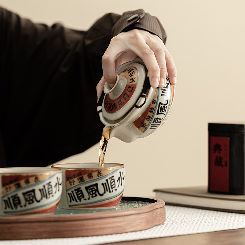 Bộ dụng cụ trà một ấm hai tách nước êm