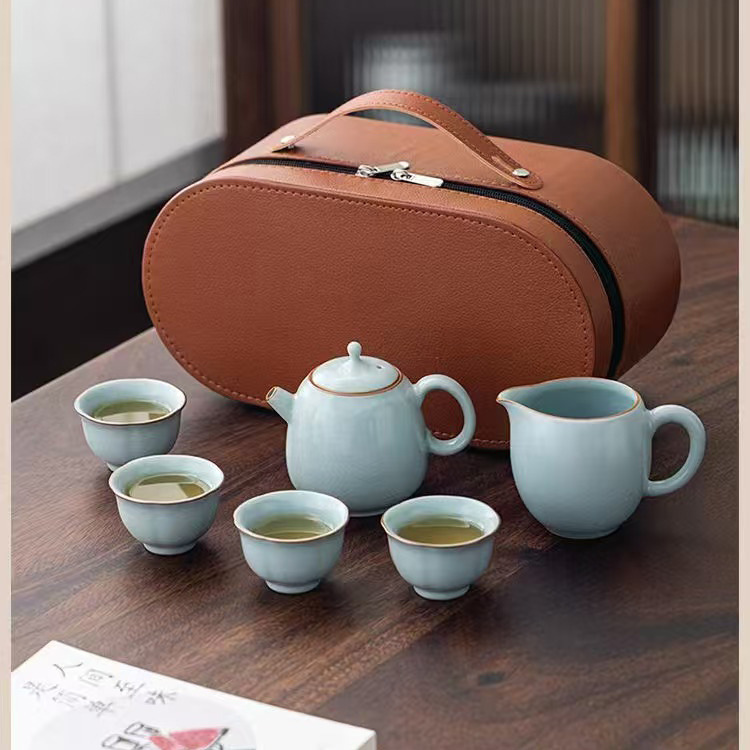 Bộ ấm trà Ru Kiln mở ra có thể nâng ấm trà sứ Ru kiểu Trung Quốc mới, một ấm bốn cốc, bộ trà du lịch Kung Fu, quà lưu niệm