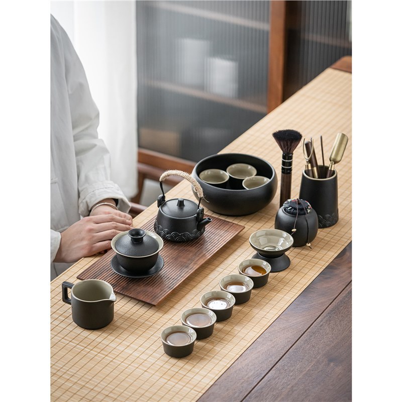Bộ ấm pha trà gốm đen văn phòng đơn giản phòng khách kiểu Trung Quốc bộ trà bộ nhỏ bộ trà Kung Fu