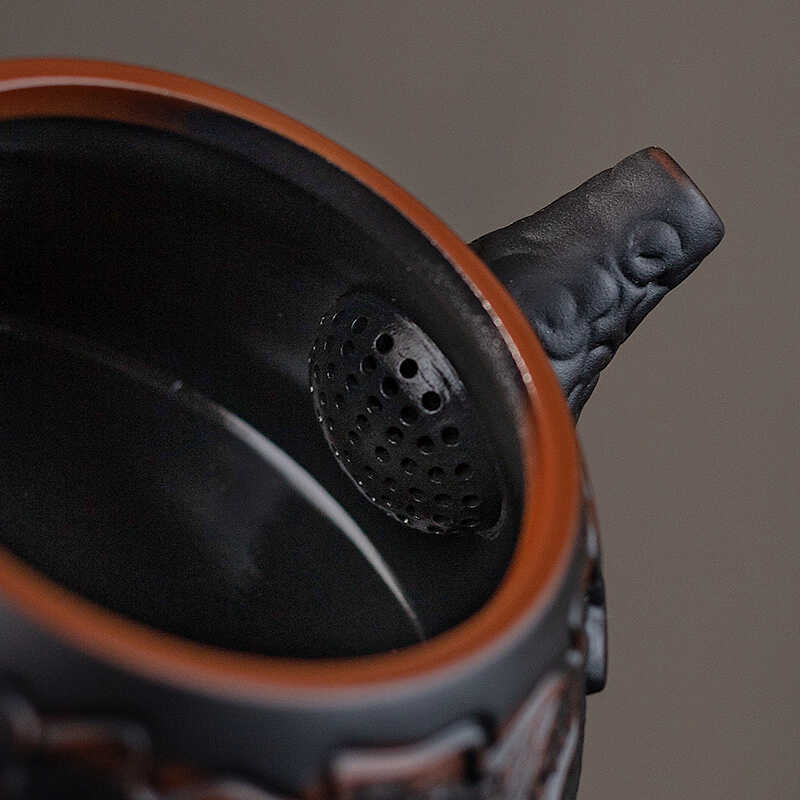 Ấm trà Fengming bằng gốm tím ấm đơn ấm đất sét màu tím nước xây nổi thủ công ấm trà cao cấp Xishi dụng cụ trà Kung Fu ấm cầm tay