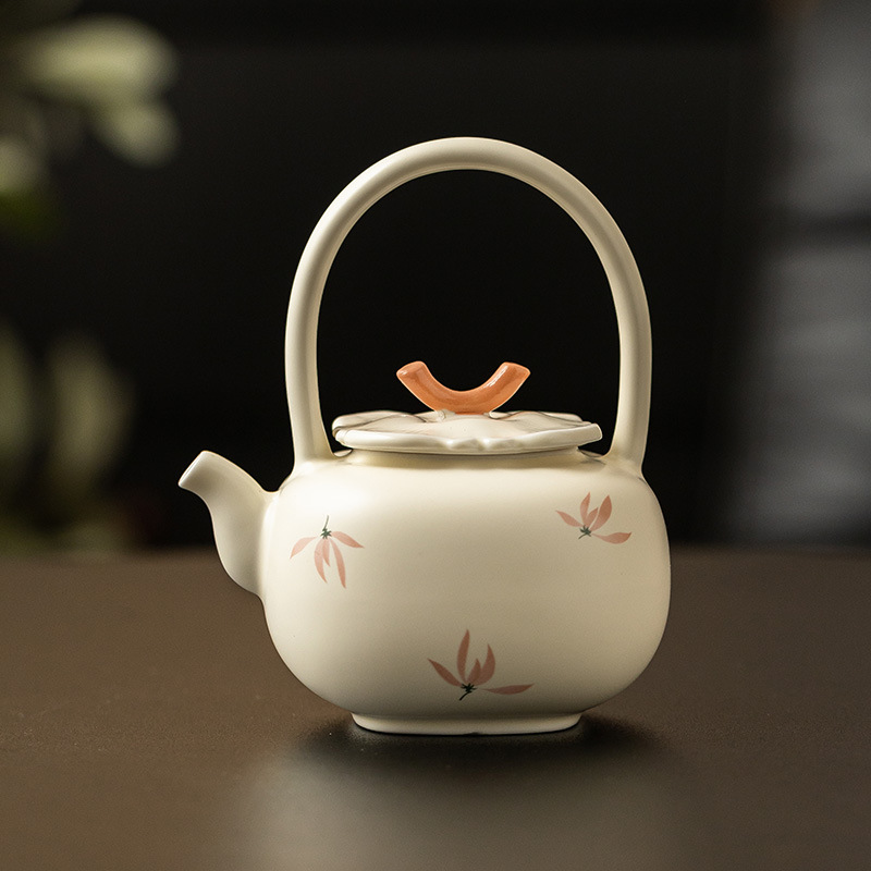 Ấm trà hoa lan tráng men màu vàng ấm trà ấm trà dụng cụ trà Kung Fu gốm sứ gia dụng ấm trà pha trà dung tích lớn cao cấp