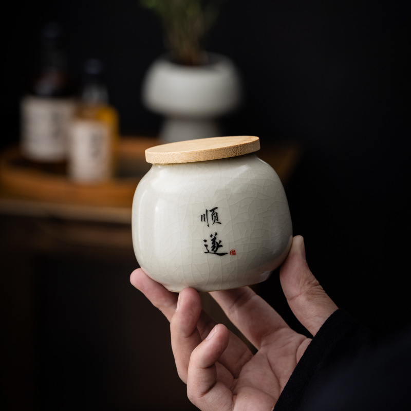 Hộp đựng trà mini thư pháp nhỏ Ruyao Hộp đựng trà trắng Wulongjing màu đỏ và xanh lá cây