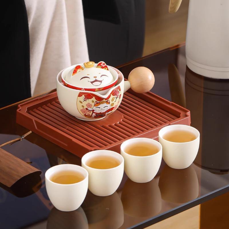 Bộ trà du lịch cốc quay nhanh mèo may mắn Một ấm bốn cốc đồ dùng pha trà lười cắm trại ngoài trời di động