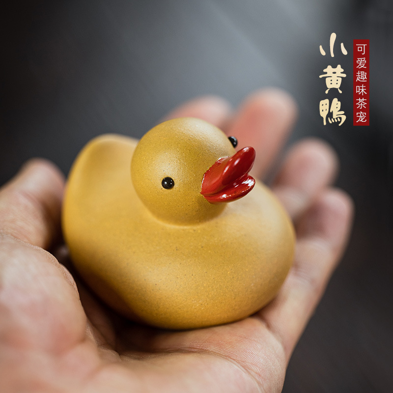 Đồ trang trí thú cưng trà vịt vàng nhỏ bằng đất sét màu tím cát thô Yixing Đồ Thủ công mỹ nghệ chơi trà vịt có thể nuôi động vật sáng tạo