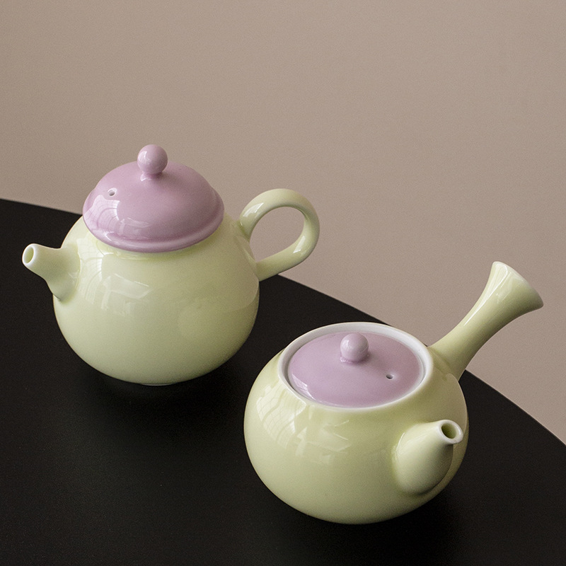 Ấm trà tay cầm bên gốm sứ tươi mới ấm trà ấm trà ấm trà ấm trà phòng trà cổ điển ấm trà tráng men màu Trung Quốc gia dụng