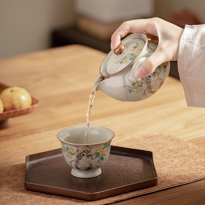 Nồi cầm tay mèo dễ thương lò Ru màu vàng gạo giả thời Tống, bình kho báu, bát trà chống bỏng, bát có nắp nhỏ, ấm trà gốm sứ cổ điển sang trọng nhẹ