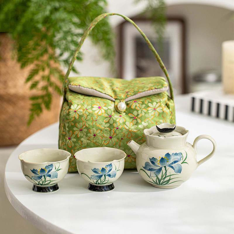 Bộ trà Kung Fu gốm sứ vẽ tay túi lưu trữ du lịch ngoài trời cốc khách nhanh gia dụng một bình hai cốc trà cầm tay