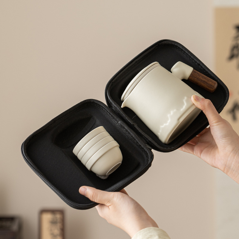 Bộ trà du lịch một ấm bốn cốc cốc khách nhanh di động cốc pha trà Kung Fu bán buôn trà ngoài trời cắm trại