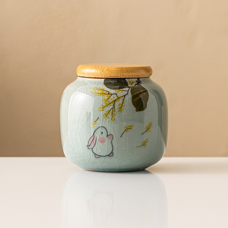 Bình trà borneol Ru Kiln bình gốm sứ mini cầm tay nhỏ bình đựng trà xanh đỏ Pu'er bình rỗng