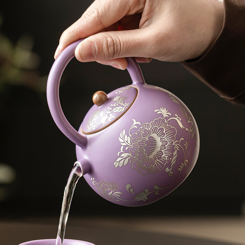 Ấm trà gốm sứ đầy đủ chạm khắc hoa mẫu đơn bạc Ấm trà gốm sứ cao cấp để pha trà gia dụng nhỏ không nóng tay Bộ trà Kung Fu đơn