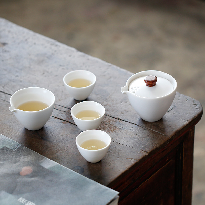 Bộ trà du lịch di động cốc khách nhanh bằng gốm Sứ đơn giản gia dụng nhỏ một ấm Ba cốc Túi xách ngoài trời trên xe