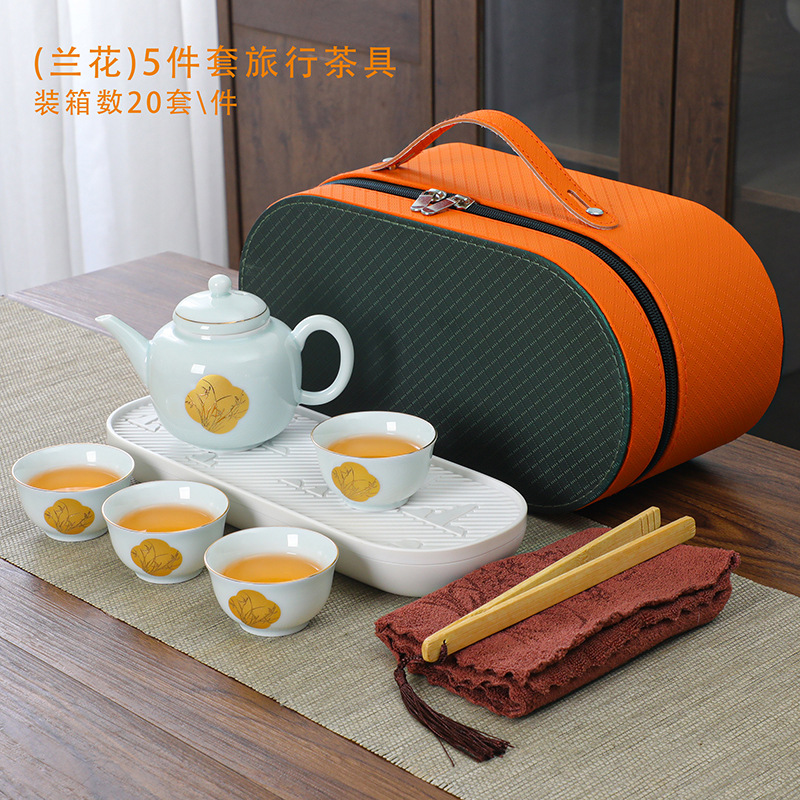Bộ trà du lịch túi đựng đồ xách tay ngoài trời bát có nắp gốm cốc trà một ấm bốn cốc bộ nhỏ khách nhanh kinh doanh