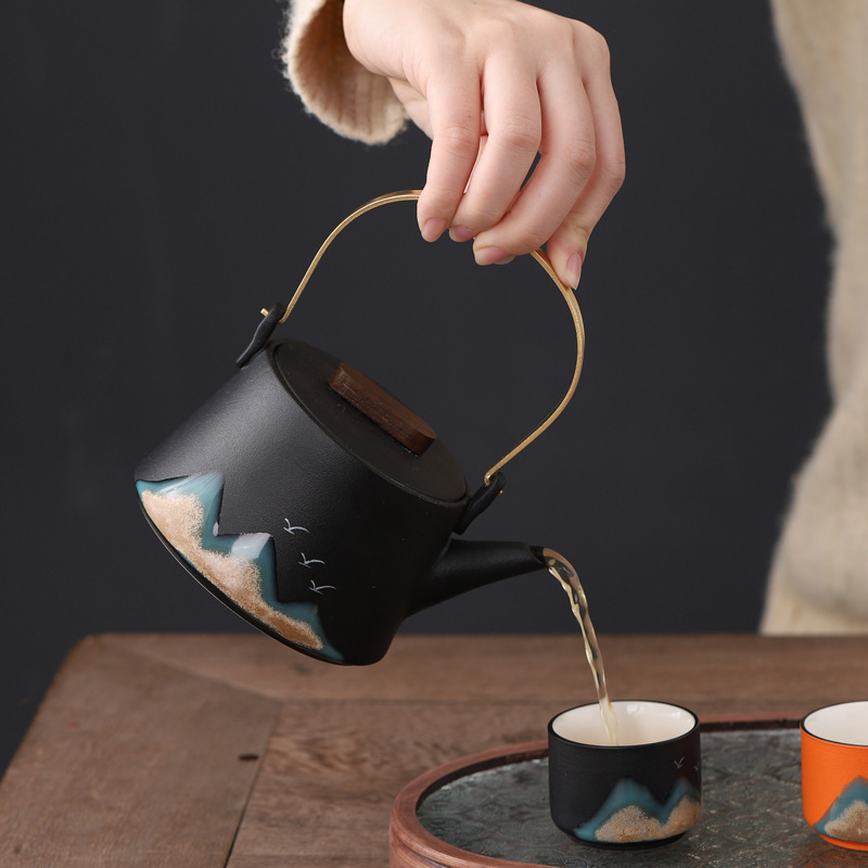 Bộ trà Kung Fu Thousand Miles Giang Sơn Bộ nhỏ gia dụng đơn giản sang trọng nhẹ xà nâng ấm chén trà gốm sứ bán buôn quà tặng