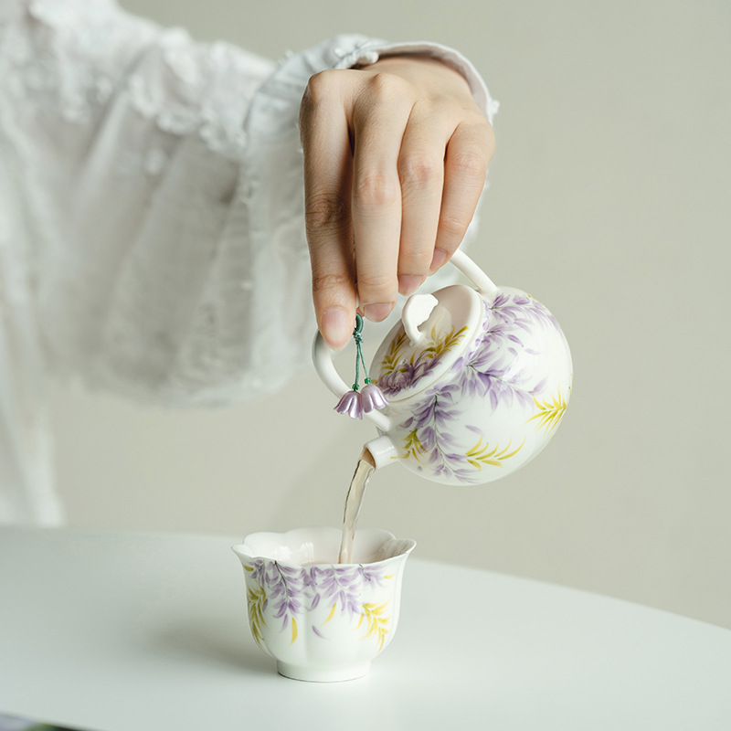 Ấm trà cầm xà nghiêng hoa tử đằng vẽ tay tinh khiết ấm trà gốm sứ ấm trà pha trà chuyên dụng gia dụng có dây xách tay