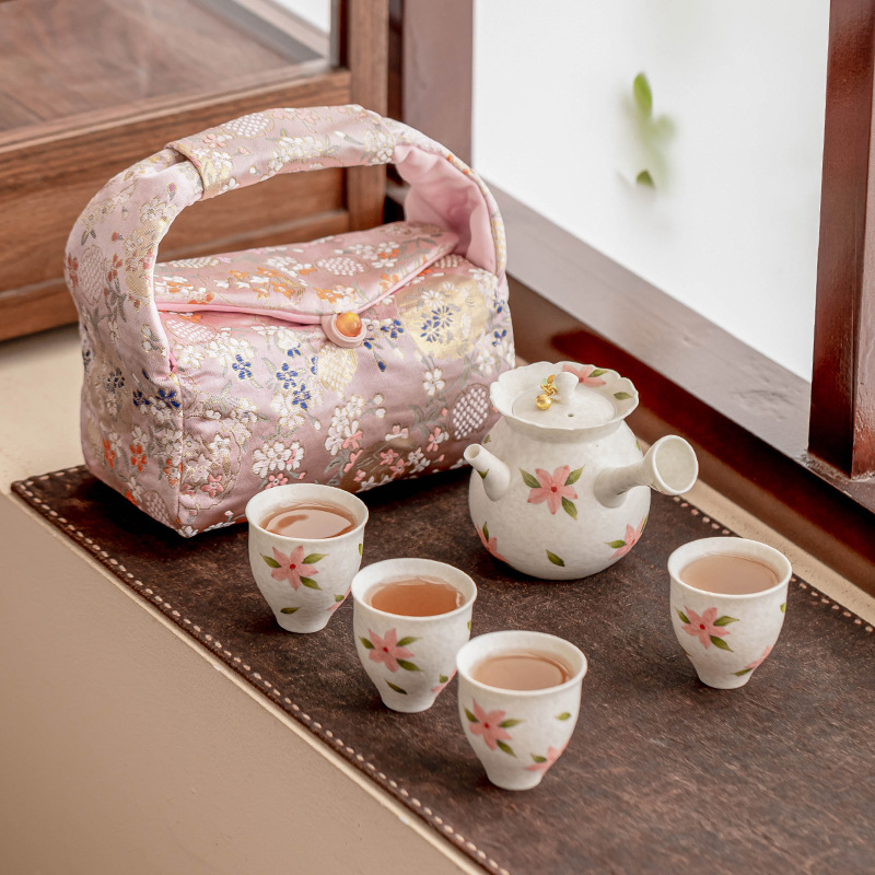 Bộ ấm trà tay cầm bên hoa anh đào mỏ đá Bộ ấm trà cầm tay ngoài trời Bộ ấm trà du lịch giá trị cao