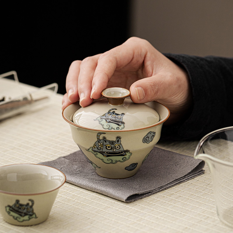 Bộ ấm trà du lịch đơn ngoài trời di động bong bóng nhỏ Kung Fu gốm sứ nhanh cốc một ấm hai cốc
