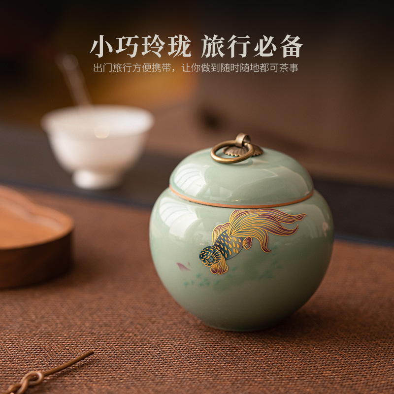 Hộp kín trà men ngọc Ru Lò nhỏ sáng tạo koi dung tích nhỏ trà xanh trà đen cầm tay gia dụng
