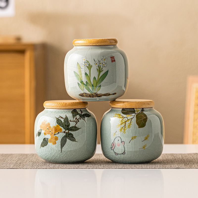 Bình trà borneol Ru Kiln bình gốm sứ mini cầm tay nhỏ bình đựng trà xanh đỏ Pu'er bình rỗng