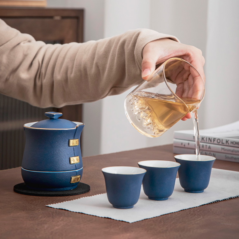 Bộ ấm trà du lịch bán tự động gốm sứ, túi xách tay, một ấm bốn cốc, bát mài đá lười nhanh