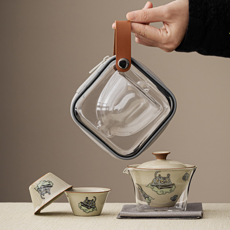 Bộ ấm trà du lịch đơn ngoài trời di động bong bóng nhỏ Kung Fu gốm sứ nhanh cốc một ấm hai cốc