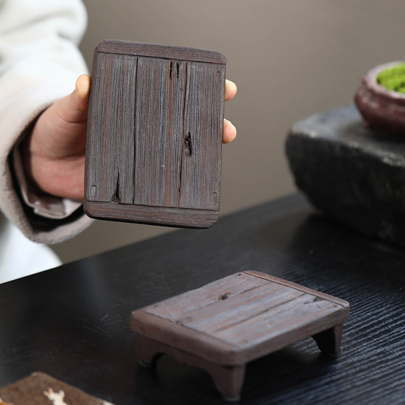 Tấm lót bình đất sét Tím Nghi Hưng đồ trang trí đồ trang trí bằng gốm thô bàn nhỏ vân gỗ nhân tạo có thể nâng cao tấm lót cốc khay đựng trà