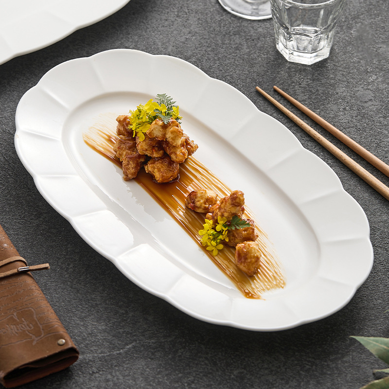 Đĩa gốm cao cấp cảm giác ẩm thực gia dụng đĩa ăn sáng tạo bộ đồ ăn khách sạn đĩa hình bầu dục cỡ lớn đĩa đựng cá viền hoa