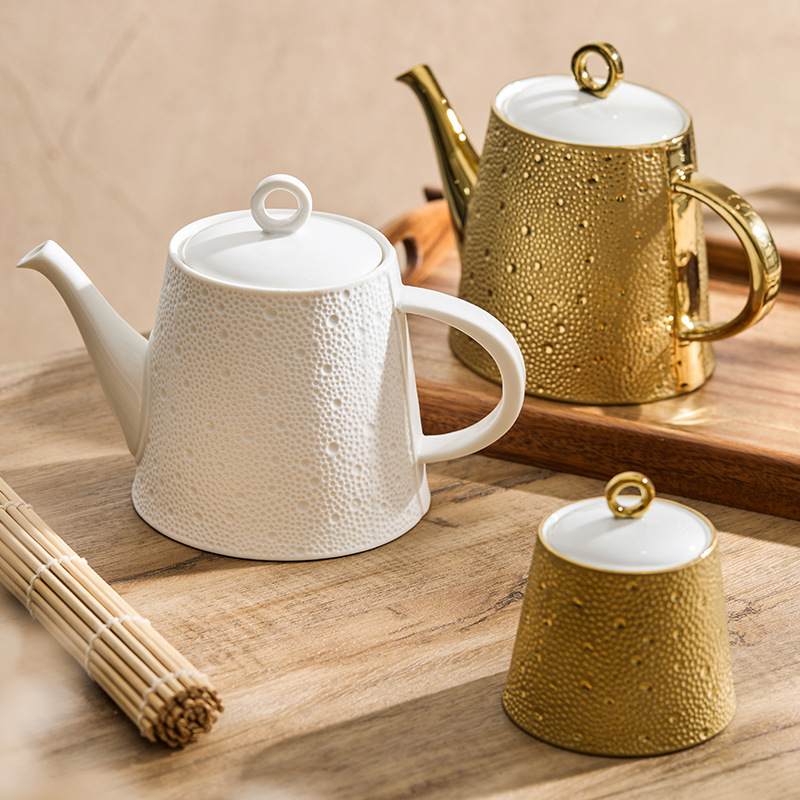 Ấm trà gốm sứ mưa sao băng ấm trà gia dụng có tay cầm ấm trà chiều sáng tạo cao cấp sang trọng ấm trà hoa lọc