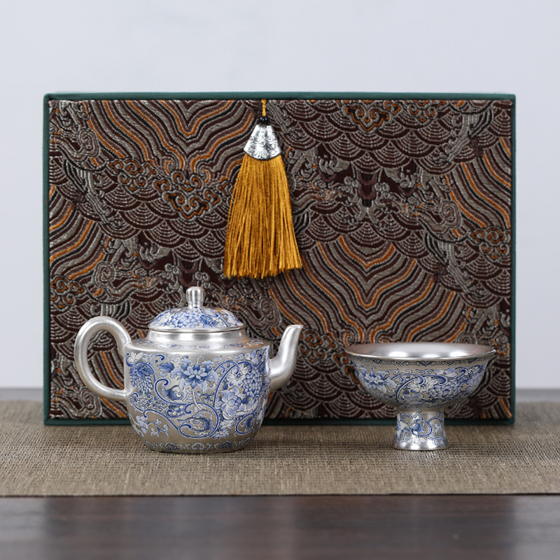 Ấm trà Kung Fu gốm sứ gia dụng màu bạc mạ bạc màu xanh và trắng làm thủ công ấm trà cầm tay hoa sen