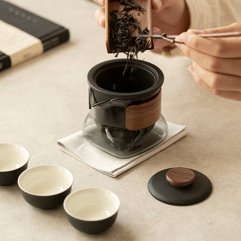 Bộ trà du lịch gốm sứ Chupu Bộ quà tặng ngoài trời xách tay nhanh khách một ấm ba chén ấm pha trà thủy tinh
