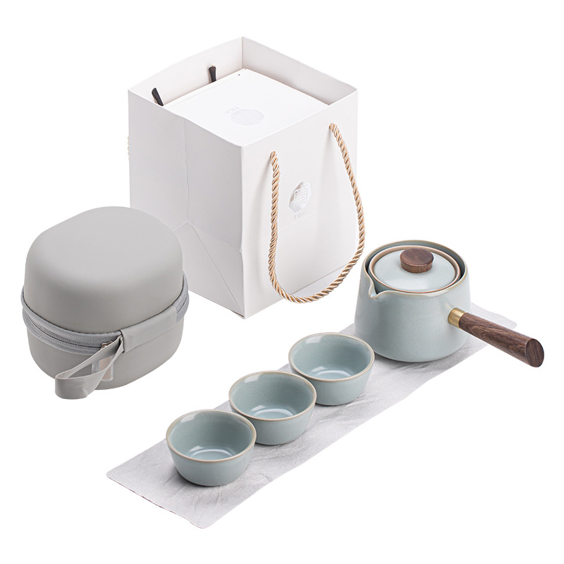 Bộ trà du lịch Xiaoyao Bộ trà gốm sứ Ru Kiln một ấm ba cốc cốc chở khách di động Bộ trà xe hơi ngoài trời có khay trà
