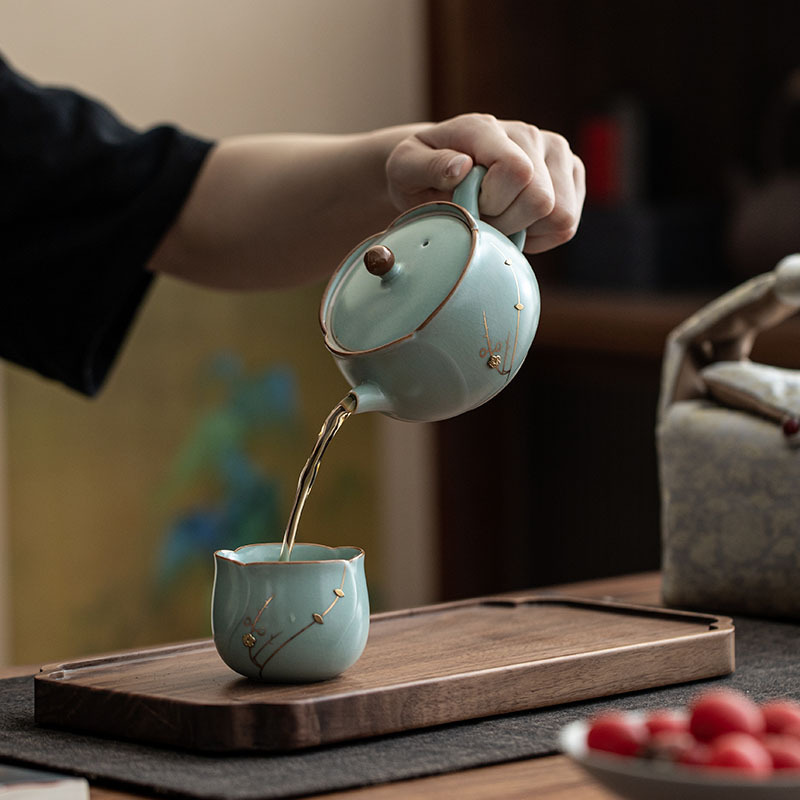 Bộ dụng cụ pha trà du lịch cầm tay một ấm một cốc ở lò Cucurn Bộ dụng cụ pha trà gốm sứ có thể mở được cho một người uống ngoài trời