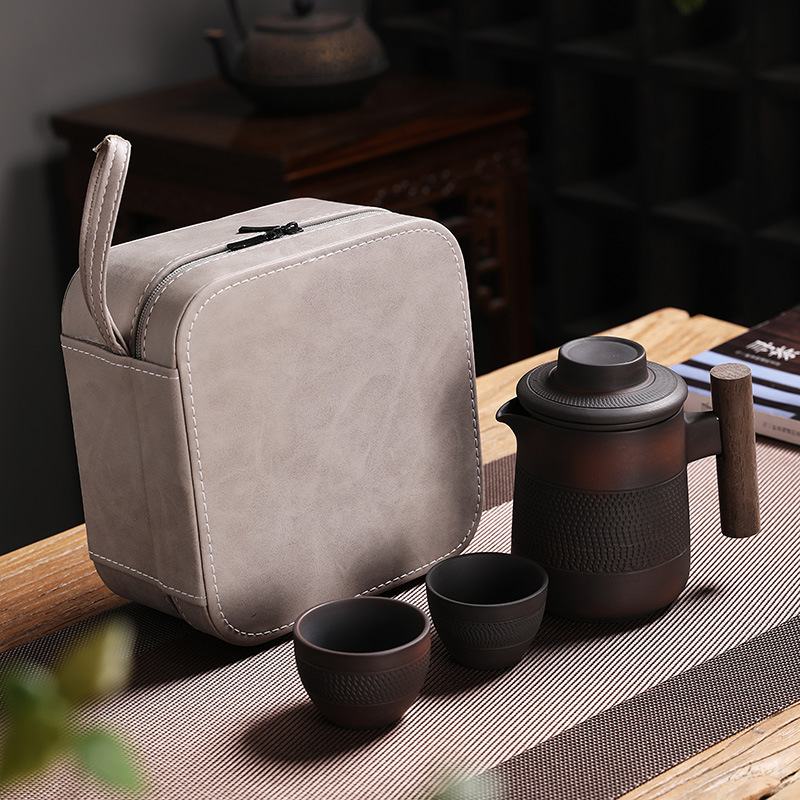 Bộ ấm trà du lịch gốm tím xách tay du lịch ngoài trời xe du lịch cao cấp khách nhanh một ấm bốn cốc bán buôn quà lưu niệm