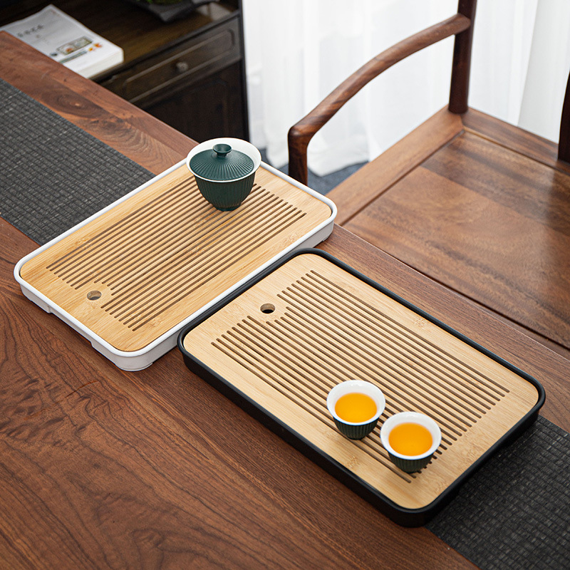 Khay trà nhỏ gia dụng thoát nước bàn trà đơn giản khay tre pha khô melamine hình chữ nhật bộ trà Kung Fu lưu trữ nước bán buôn