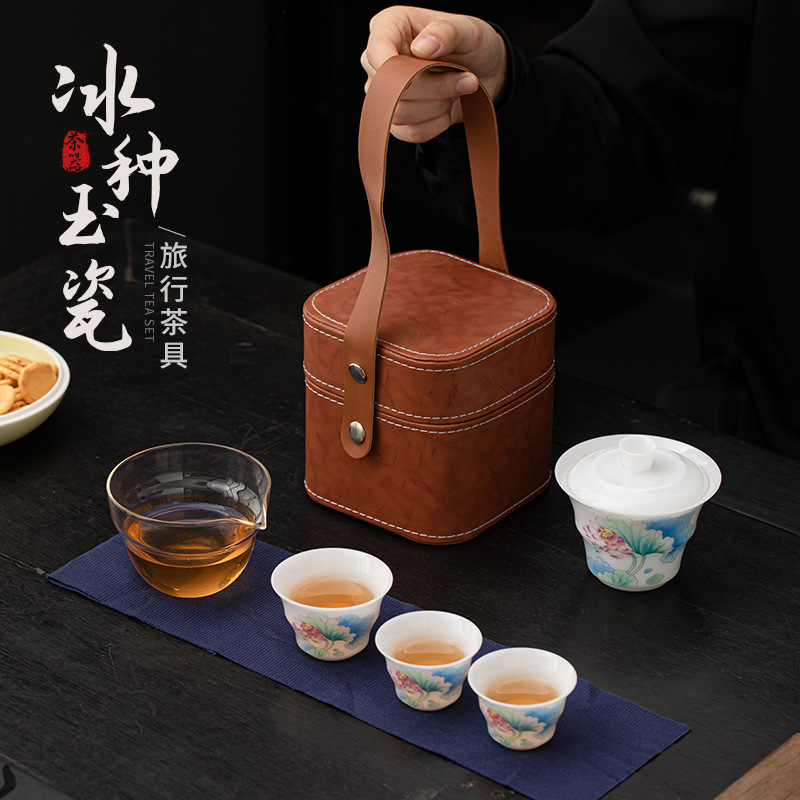Bộ trà du lịch hoa sen bằng sứ ngọc bích phong cách Trung Quốc mới ngoài trời di động nhanh cốc gốm sứ một bát ba cốc trà