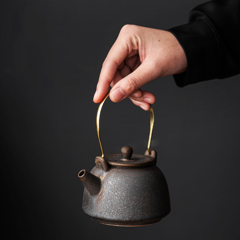 Ấm trà gốm sứ gia dụng ấm trà có dầm lọc cổ điển kiểu Trung Quốc ấm trà bộ trà công phu ấm trà ấm trà một ấm bán buôn