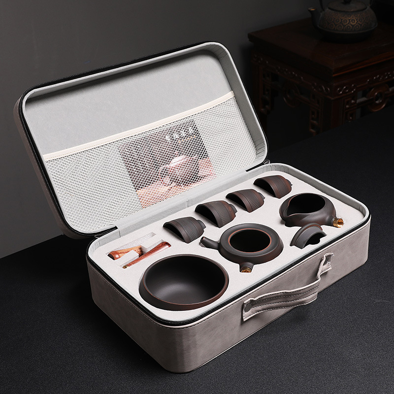 Bộ ấm trà du lịch gốm tím xách tay du lịch ngoài trời xe du lịch cao cấp khách nhanh một ấm bốn cốc bán buôn quà lưu niệm