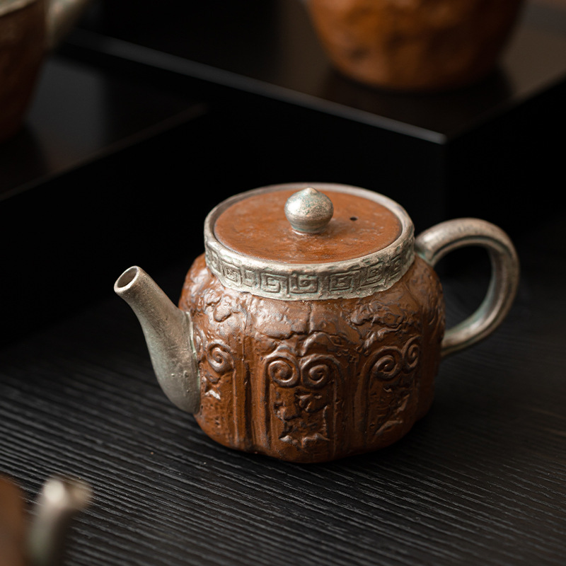 Ấm trà mạ bạc cổ phong cách Trung Quốc ấm trà gốm sứ gia dụng ấm tay cầm chùm dụng cụ trà Kung Fu ấm trà lọc lỗ bóng ấm đơn