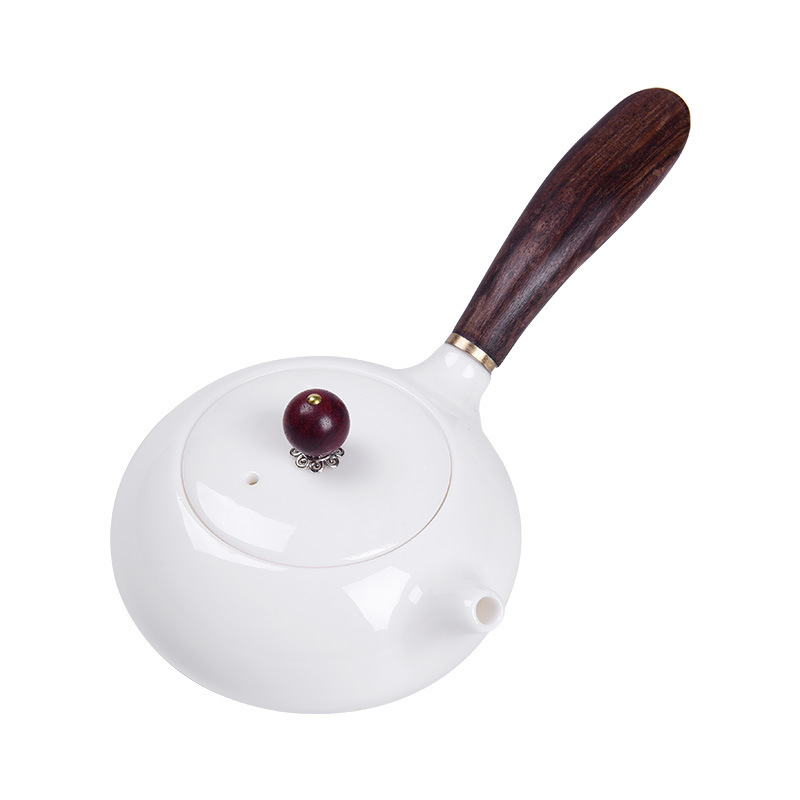 Ấm trà sứ trắng ngọc bích Dehua ấm trà gốm sứ bên tay cầm gia dụng có lưới lọc bộ trà Kung Fu đơn ấm bán buôn