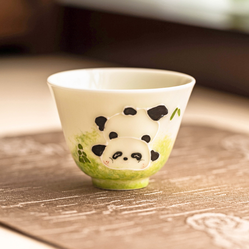 Cốc trà gốm sứ vẽ tay đống gấu trúc chạm khắc Ruyi cốc dụng cụ trà gia dụng sáng tạo cốc trà cốc trà cốc chủ nhân