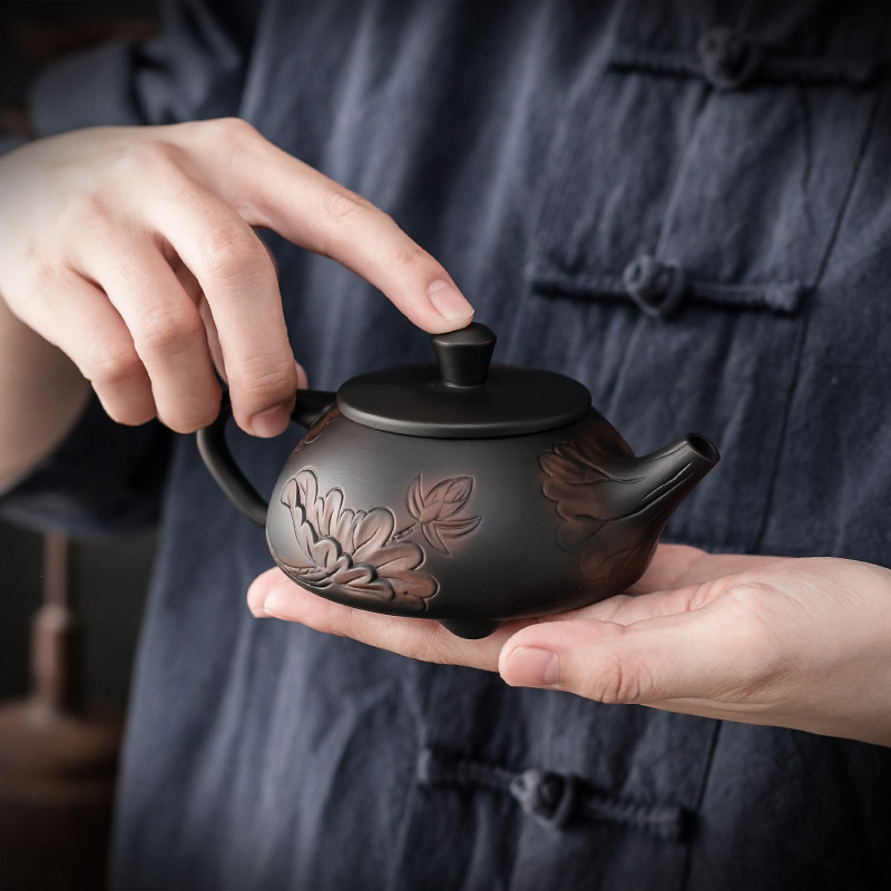 Bán buôn ấm trà Gốm Tím dao nhảy thủ công dụng cụ trà Kung Fu đơn dung tích lớn gia dụng dụng cụ trà gốm sứ cỡ nhỏ ấm đá