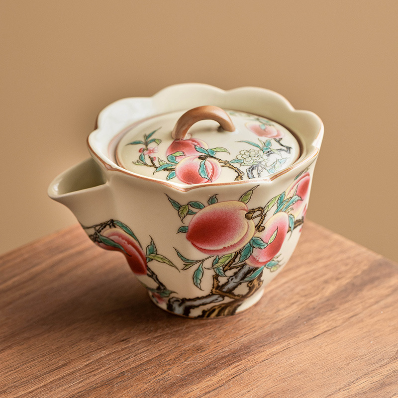 Ấm cầm tay miệng hoa đào chín hoa đào Ruyao ấm trà gốm sứ cao cấp gia dụng ấm đơn lọc bộ trà Kung Fu ấm pha trà