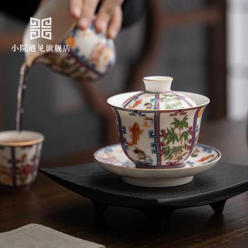 Đồ sứ trắng tráng men cao cấp Jucai Sancai có nắp bát Bộ trà Kung Fu Đồ sứ gia dụng không nóng bát trà bán buôn