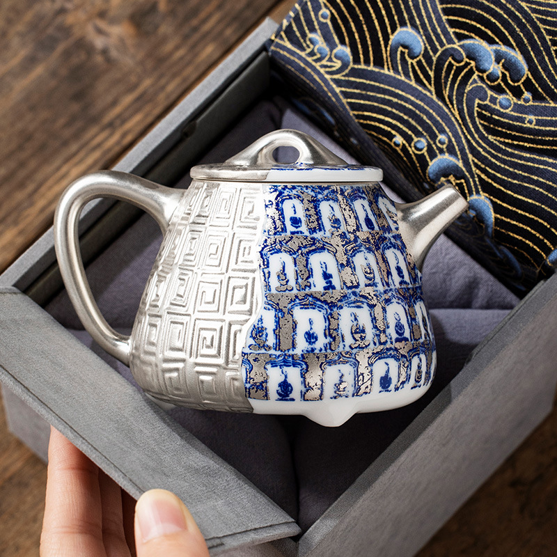 Bộ ấm trà Ngàn Phật Đôn Hoàng màu xanh và trắng của He Fusen tặng quà sinh nhật cho nam và nữ lãnh đạo lớn tuổi