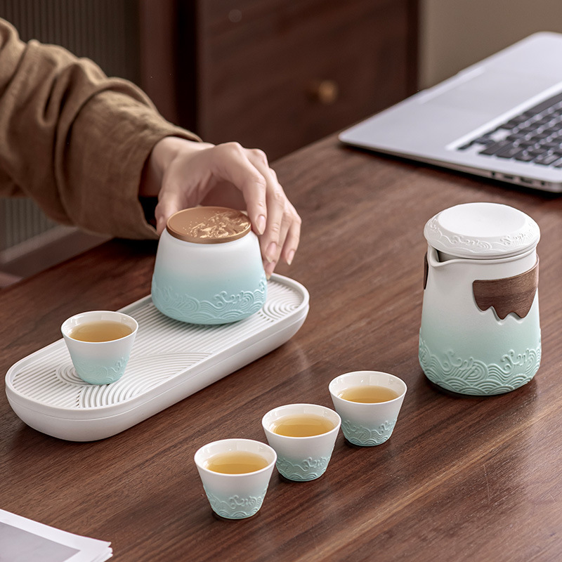 Bộ trà du lịch kiểu Nhật Bộ trà Kung Fu một ấm bốn cốc cốc khách nhanh ngoài trời cao cấp hiện đại đơn giản xách tay