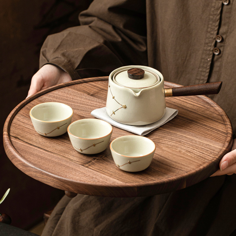 Ấm trà gốm sứ kiểu Trung Quốc ấm trà gốm sứ kiểu Trung Quốc ấm trà gia dụng ba chén ngoài trời cầm tay không nóng