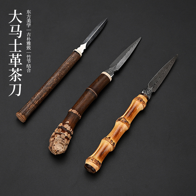 Nhà sản xuất bán buôn tự nhiên roi tre tím tay cầm dao Trà Kim Trà Wenwan tre Pu'er dao mở Bánh trà Phụ Kiện Bộ trà hình nón