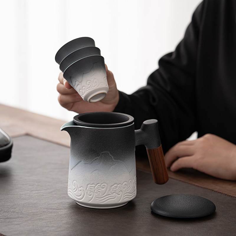 Bộ trà du lịch gradient di động bộ nhỏ cốc khách nhanh ngoài trời di động một ấm ba cốc cốc gốm sứ ấm pha trà