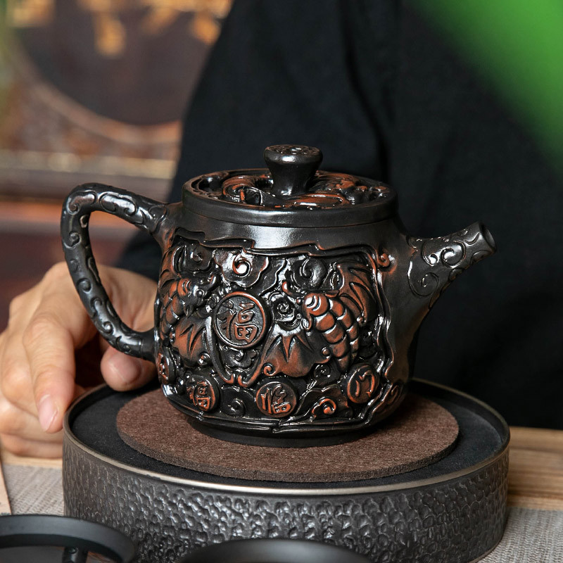Ấm trà gốm tím chạm khắc toàn bộ ấm trà đất sét tím thủ công Hanwa Jianshui Wufu Linmen bộ pha trà văn phòng gia đình cao cấp