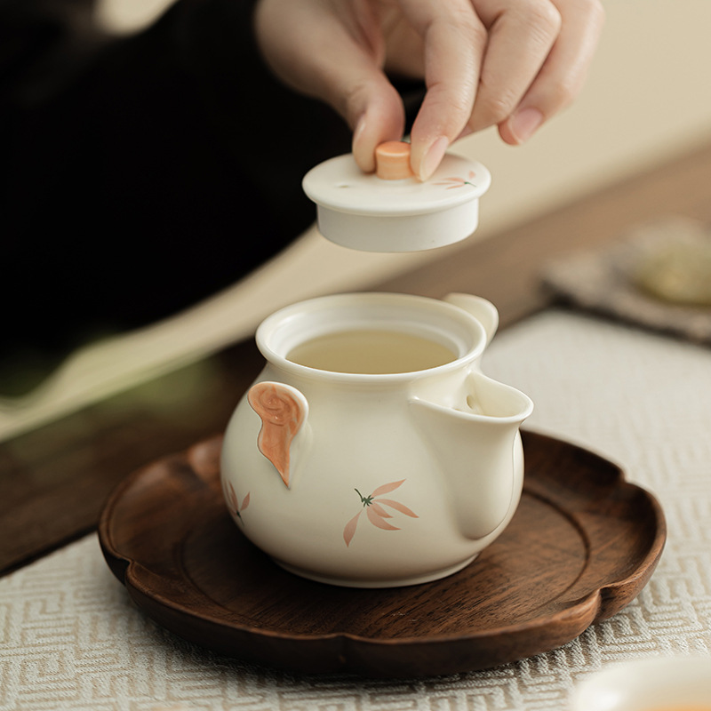 Chuông gió phong lan Ấm cầm tay đám mây tốt lành gốm sứ gia dụng dụng cụ pha trà Kung Fu Trung Quốc dụng cụ pha trà lọc tay không nóng